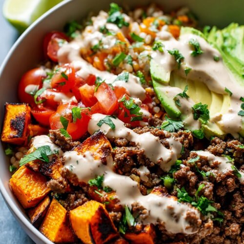 Delicious Ground Beef Sweet Potato Taco Bowl with Lime Crema extra recipe photo